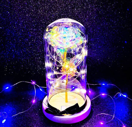 LED Enchanted Galaxy Rose Eternal 24K Gold with fairy strung lights.